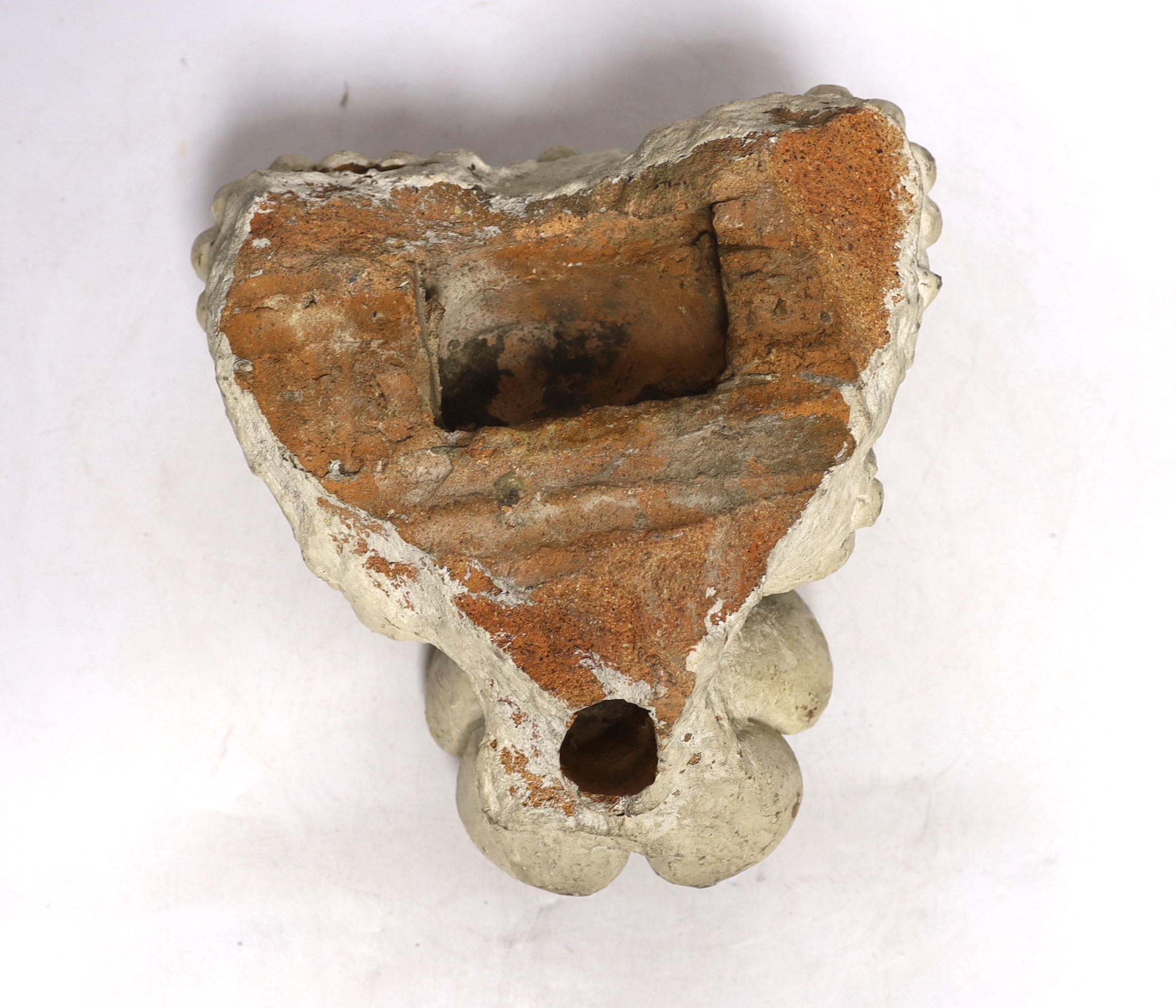 A White painted terracotta architectural cresting in the form coronet over a Tudor rose, 26cm high